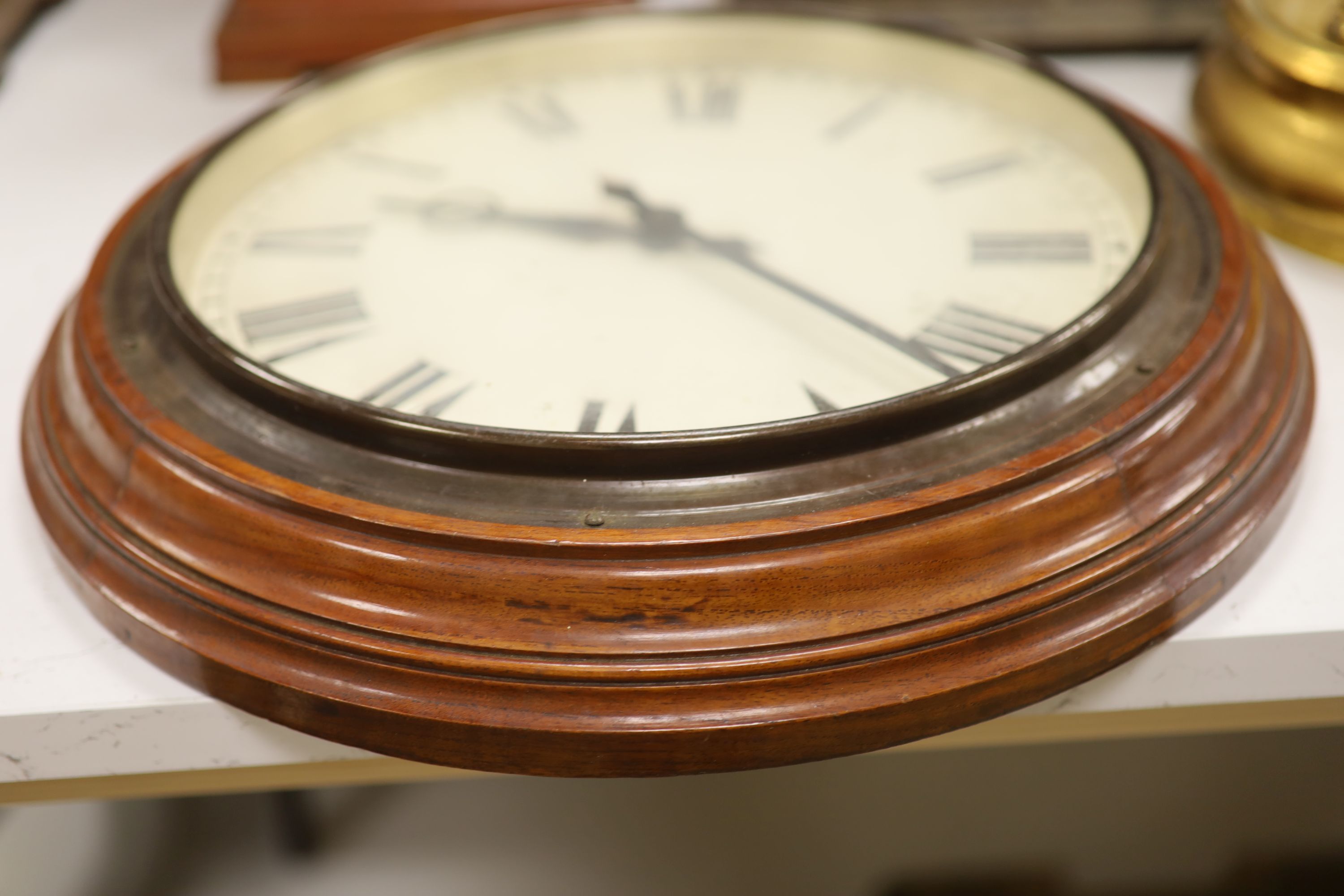 An electric mahogany electric wall slave dial, diameter 39cm